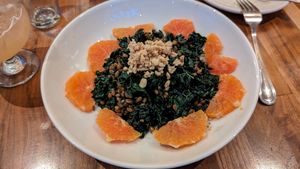 Warm kale and farro salad vegan at Cafe Flora in Seattle