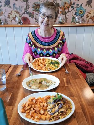 Scrambled tofu with roast potatoes and vegan biscuits and gravy. at Cafe Flora in Seattle