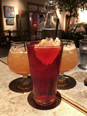 Ginger Cranberry Spritz in center at Cafe Flora in Seattle