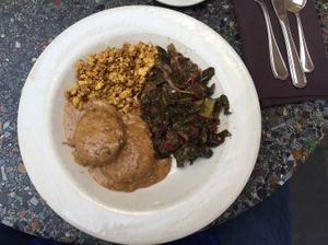 The vegan version of the Southern Platter. Biscuits and gravy, tofu scramble, and collards. The biscuits and tofu scramble in this dish are consistently perfect.  at Cafe Flora in Seattle