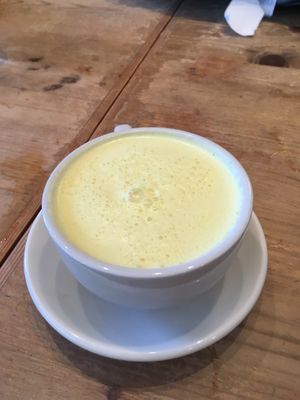 Golden Milk (vegan) : coconut milk, turmeric, black pepper, ginger, cardamom, coriander & chaga at Cafe Flora in Seattle