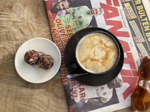 oat milk latte and chocolate vegan raw balls  at The Coffee Grinder in Datca