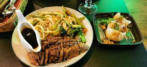 udon noodles with crispy duck and vegetables / dumplings at Vegan Bar in Schwerin