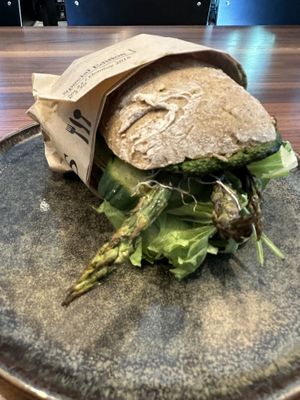 Bun sandwich with green asparagus  at Nina‘s Deli in Dreieich