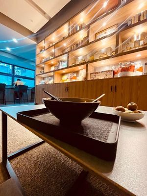 Shelves have vegan milks and dry goods for sale at Vegan Vegetable Food Exchange - 蔬食汇 in Shenzhen