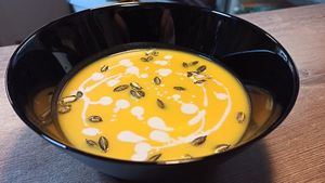 Sweet potato and pumpkin cream soup with coconut milk and roasted pumpkin seeds at Vitu Kitchen - кухня ВИТУ in Plovdiv