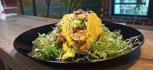 TACO with chickpeas, roasted red peppers, sauce with peas and pickles, cherry tomatoes, green leaves and sprouts. at Vitu Kitchen - кухня ВИТУ in Plovdiv