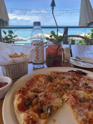 Vegan pizza, strawberry mojito mocktail   at Sea Shed in Speightstown