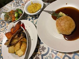 Baked Turkey Wellington, creamed corn, green bean casserole, candied yams, roasted Brussels, parsnips, carrots, mashed potato and roast potatoes. Omg!  at Morgan and Watson  in South East London