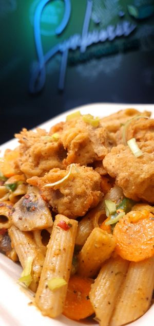 Spicy Mushroom Pasta at Symbiosis Plant-based Eats in Paramaribo