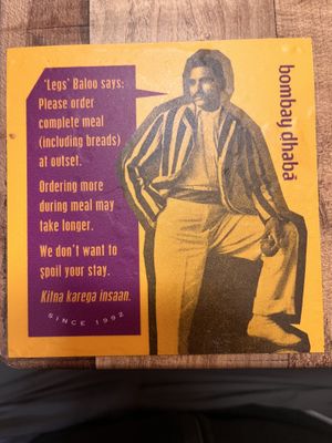 Sign on the tables  at Bombay Dhaba in Upper Mount Gravatt