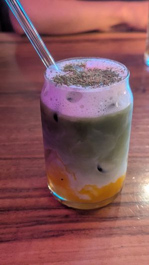 Matcha mango latte with oat milk at L'Quán in Hamburg