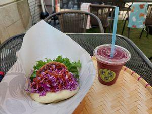 BBQ burger bun and acai berry smoothie at Luu's Bao in Osaka