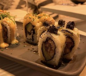 Ibiza
Heura salteado con aceite de lima kaffir, piña asada con cobertura de
queso, aceite nikkei y trufa negra con salsa de tamarindo. at Veg & the Gang - Carrer Casanova in Barcelona