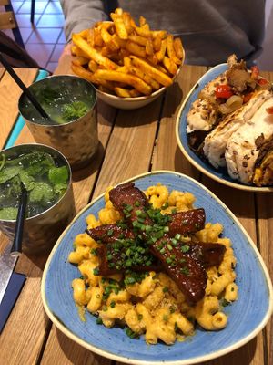 Philly cheesesteak sandwich and Mac and cheese ribs at Herbivorous - Withington in Manchester