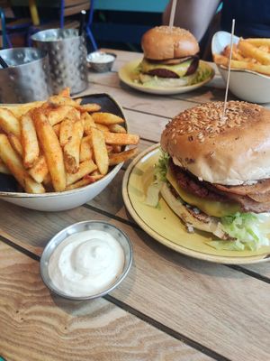 Double bacon burger and paprika fries with garlic dip at Herbivorous - Withington in Manchester