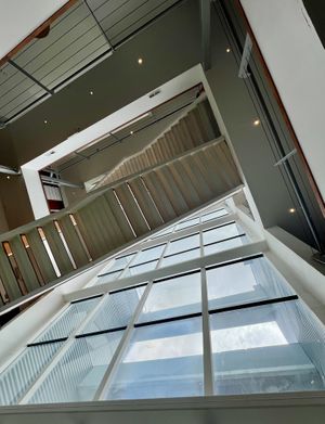 High ceiling, bright window   at Hablemos Coco Cafe in Puerto Natales