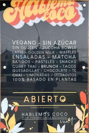 Poster  at Hablemos Coco Cafe in Puerto Natales