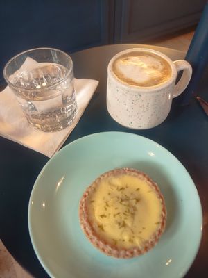 Lemon tart and cappuccino at I Quit - Café & Bakery in Mexico City