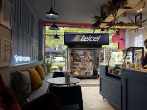 Indoor and outdoor seating  at I Quit - Café & Bakery in Mexico City