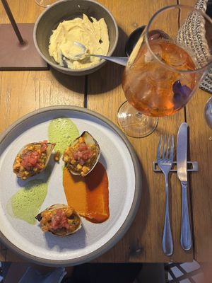 Briam with hummus and a spritz to drink  at Kaliya in Santorini