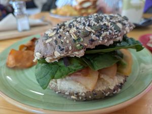 Hummus sandwich filled with unripe tomato at Feria 83 in Sevilla