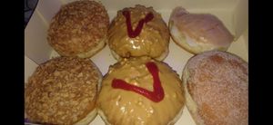 Caramel crunch, PB and Jelly Glazed, and Jam at That's Alotta Cafe in Northcote