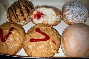 PB Nutella, Jam, Nutella, Glazed Nutella, and PB Jam. at That's Alotta Cafe in Northcote