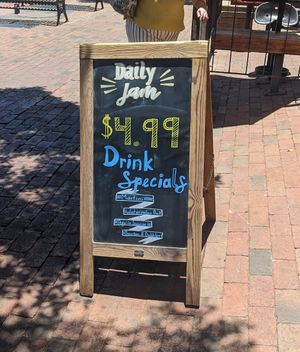 Drink specials advertisement at Daily Jam in Tempe