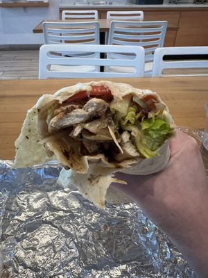 Grilled C Wrap- Grilled vegan chick'n, grilled onions, cabbage, carrot, lettuce, tomato, with 1000 Island dressing. Wrapped in a flour tortilla.  at Envegan in East Point