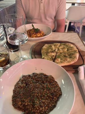 Porcini risotto (vegan) and garlic bread no cheese - all very tasty   at Bianco Restaurant in Tenerife