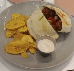 Falafel Pocket with fried plantain: chickpeas balls, tomato, cucumber, lettuce, tahini & pita bread.

 at Kitchen in Panama City