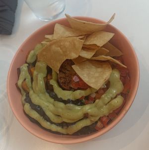 Vegan Mexican Bowl: quinoa, chips, pico de gallo, black beans, wheat based protein, avocado sauce at Kitchen in Panama City