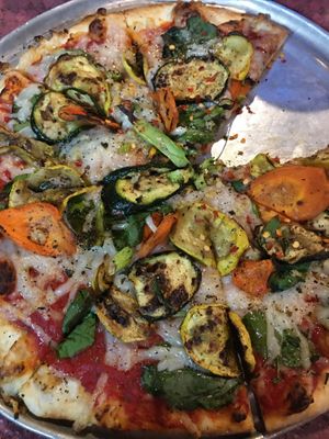One of the veggie pizza options made with vegan cheese.  at Tom's Extreme Pizzeria in Ocean Springs