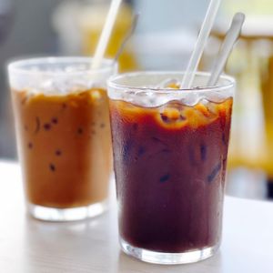 Iced viet coffee. Front one is oat mylk version  at Bún Huế Cafe in Central Singapore