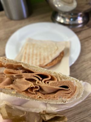 Pinsa with vegan mortadella and stracchino  at Vegustibus in Rome