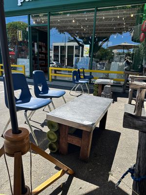 Hi seats, plastic utensils, low, metal (baking hot) table = sore back & messy eating.  Simple changes would make a huge difference.    at Thai Vegan in Santa Monica