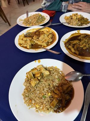 Vegetable fried rice, tofu dish, eggplant dish  at Peace in Arusha