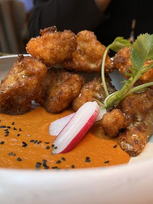 Chipotle mole cauliflower bites  at Madre in Amsterdam