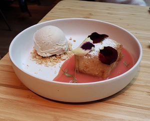 Brioche soaked in tres leches with guava salsa and ice cream at Madre in Amsterdam