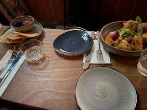 Tapas style starter (left) and main dish (right)  at Madre in Amsterdam