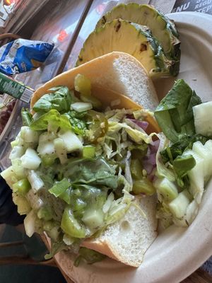 Regular size (can’t see it here due to the big pile of toppings, but they do add several slices of vegan deli cuts)  at Sub Machine in Lancaster