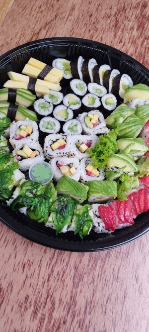 Take away veg boat, with mention of vegan at Marpha Sushi & Nepali Kitchen in Bruges