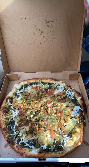 Pesto pi pizza at Pi Vegan Pizzeria in Seattle