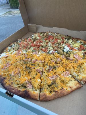 Half Mac n cheese and half pesto chicken  at Pi Vegan Pizzeria in Seattle