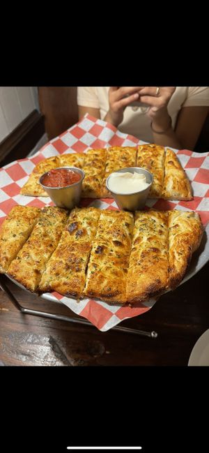 The cheesy garlic strips are so so good. And this dipping sauces ahh.  at Pi Vegan Pizzeria in Seattle