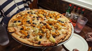 The veggie on gluten-free crust and added buffalo chicken at Pi Vegan Pizzeria in Seattle