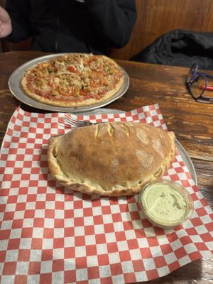 Magic Mike Calzone and the Chicken Parm GF Pizza. And the vegan ranch was SO good!   at Pi Vegan Pizzeria in Seattle