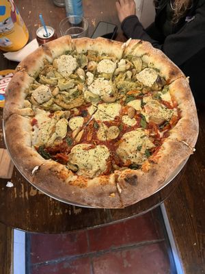 Custom pie: large size, stuffed crust, margarita fondita and okey dokey artichokey  at Pi Vegan Pizzeria in Seattle