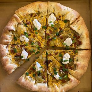 Pi Day special, baked potato pizza (ask for stuffed crust on any pizza, it’s delicious)! at Pi Vegan Pizzeria in Seattle